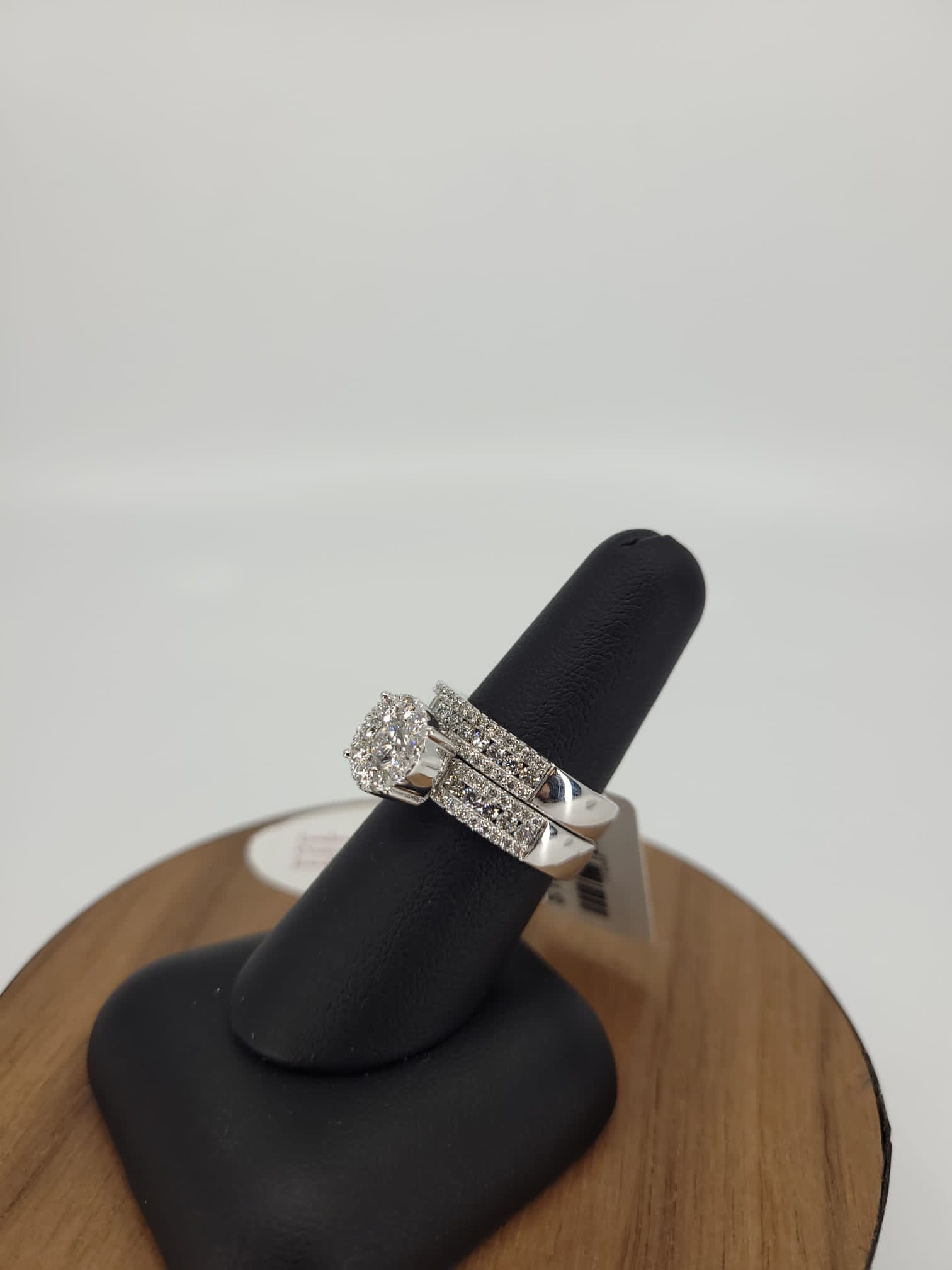 14K White Gold Cluster Setting Engagement Ring with .25 Carat Diamond Center Stone on an Invisible Halo Setting